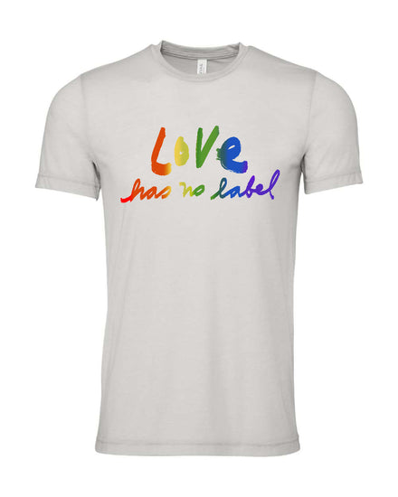 A white t-shirt with the text "Love has no label" printed on it in a rainbow color scheme.