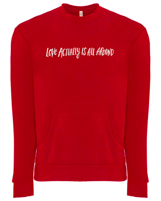 A red long-sleeved sweatshirt with the text "Love actually is all around" printed on it.