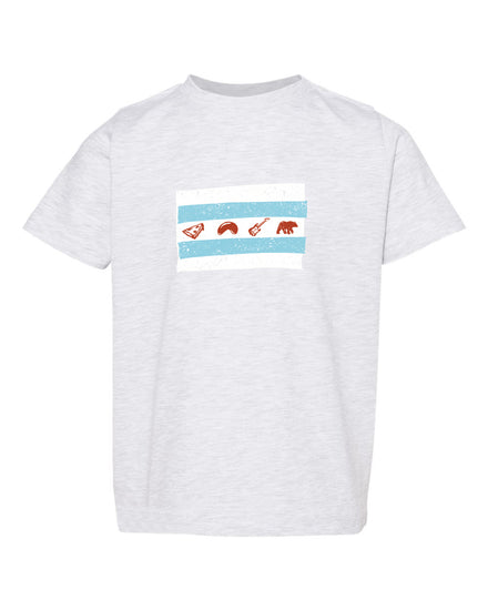 A white t-shirt with a graphic design featuring a blue stripe with three icons, including a guitar, a bear, and a bird.
