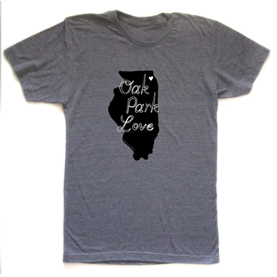 A gray t-shirt with a graphic design featuring a silhouette of a state and the text "OAK PARK LOVE" printed on it.