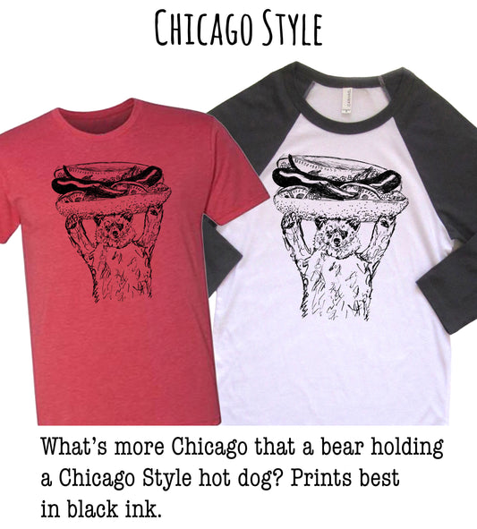 two t-shirts with a graphic of a bear holding a hot dog. The text above the t-shirts reads "Chicago Style" and below the t-shirts, there is a question asking "What's more Chicago that a bear holding a Chicago Style hot dog? Prints best in black ink."