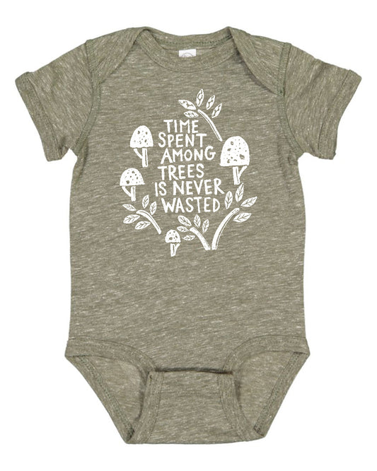 a baby bodysuit that says time spent by trees is never wasted