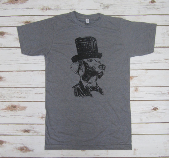A gray t-shirt with a black graphic of a dog wearing a top hat printed on it.