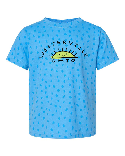 A blue t-shirt with a polka dot pattern and the text "WESTERVILLE OHIO" printed on it.