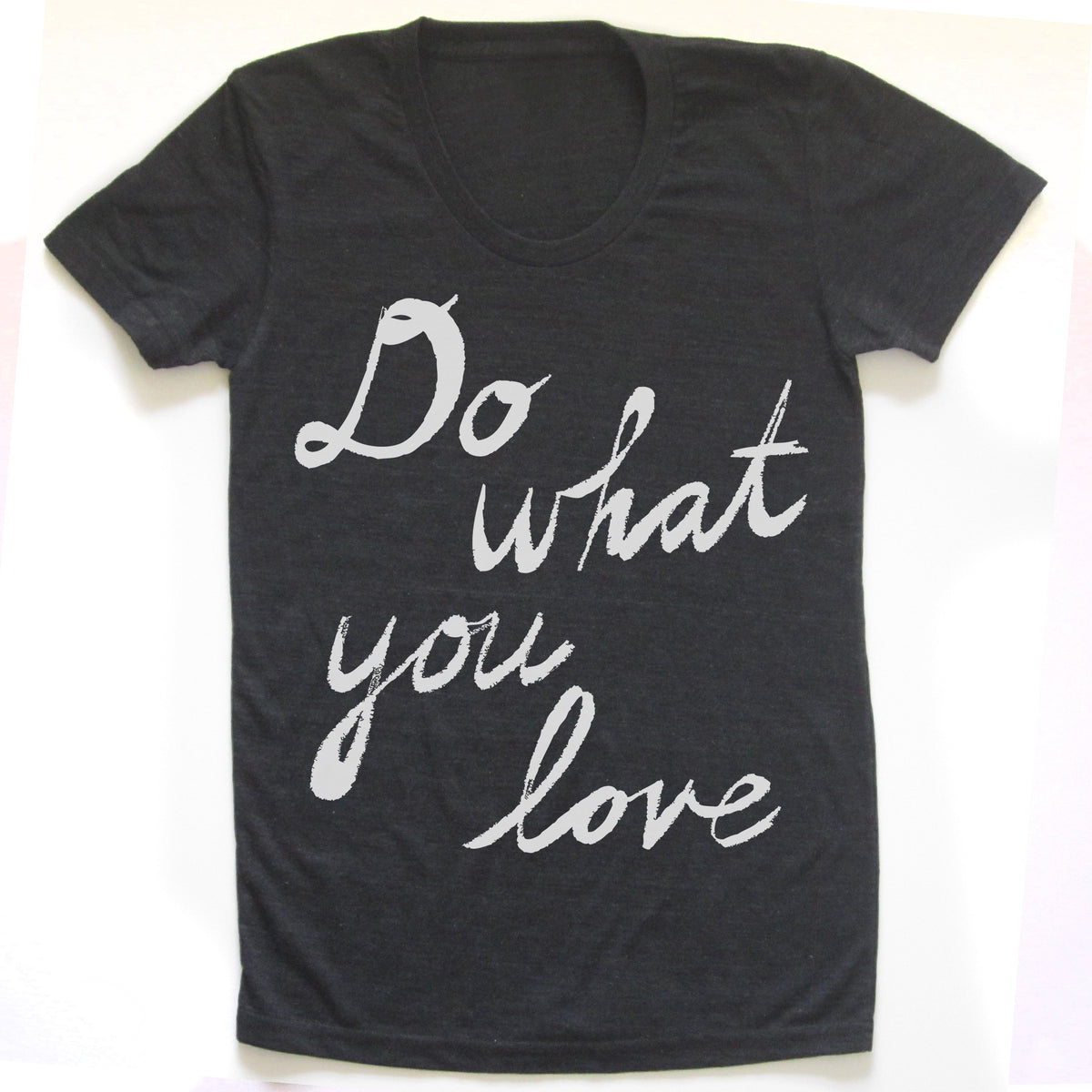 a black t-shirt with white text that reads "Do what you love".