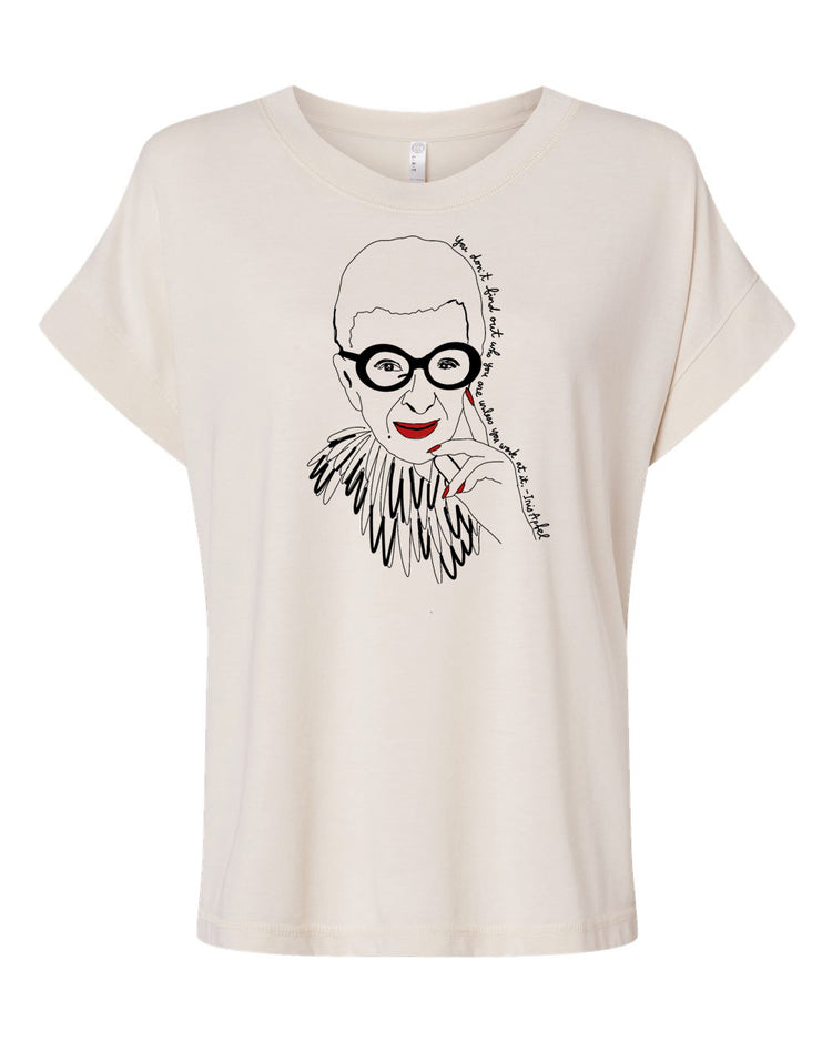 A t-shirt with a graphic design depicting a stylized portrait of a person wearing glasses and a feather boa.