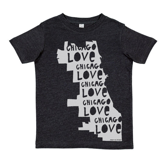 A black t-shirt with a graphic design depicting the word "CHICAGO" in a stylized font, arranged vertically along the length of the shirt.