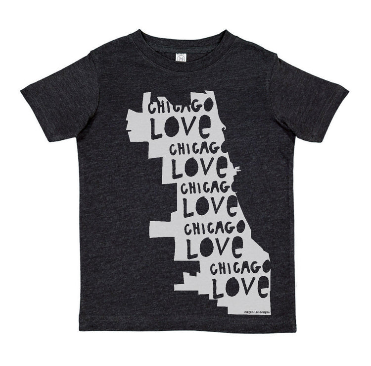 A black t-shirt with a graphic design depicting the word "CHICAGO" in a stylized font, arranged vertically along the length of the shirt.