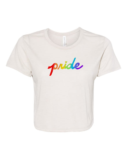 A white t-shirt with the word "pride" printed in a rainbow color scheme.
