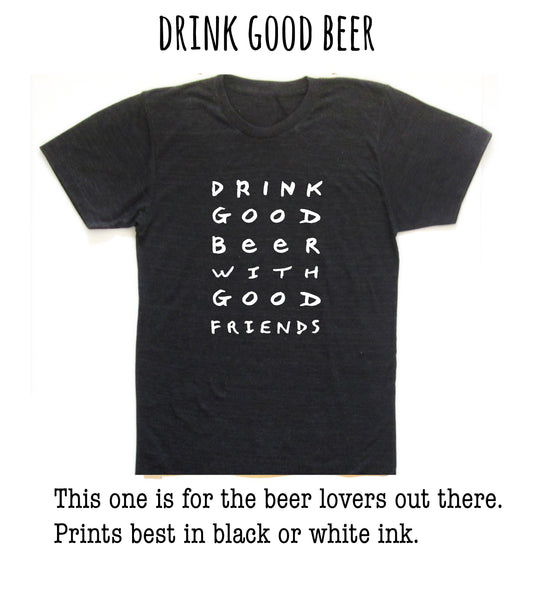 A black t-shirt with white text that says "DRINK GOOD BEER" printed on it.