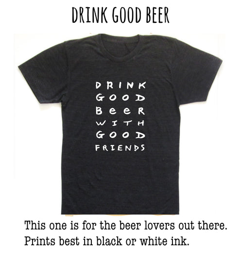 A black t-shirt with white text that says "DRINK GOOD BEER" printed on it.
