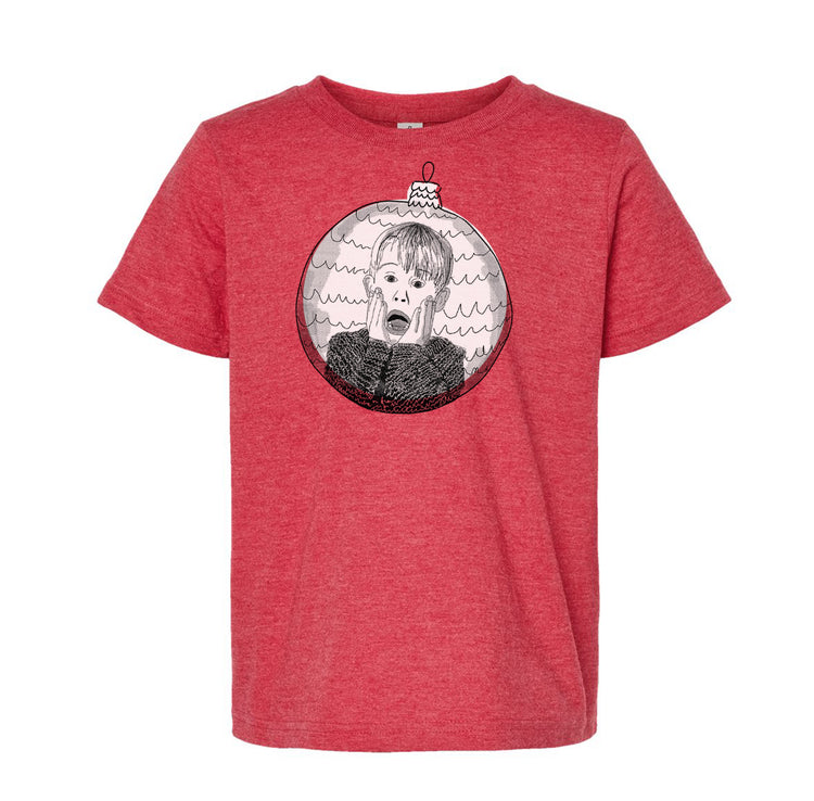 A red t-shirt with a graphic design depicting a person's face with a distressed expression, surrounded by a circular pattern.