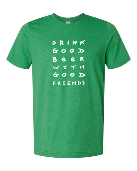 A green t-shirt with white text printed on it.