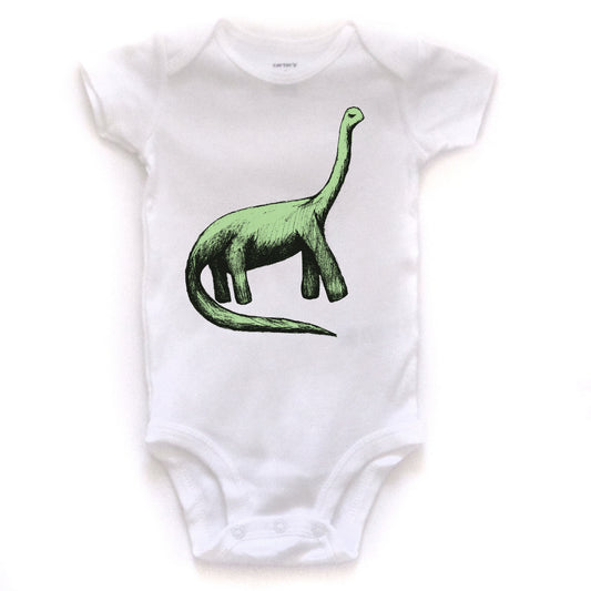 A white baby onesie with a green dinosaur graphic printed on it.