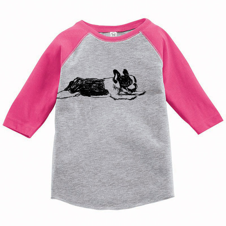 A gray and pink long-sleeved shirt with a black and white illustration of a dog on the front.