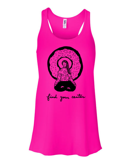 A pink tank top with a graphic design depicting a person sitting in a meditative pose, surrounded by a circular pattern. The text below the graphic says "find your center".