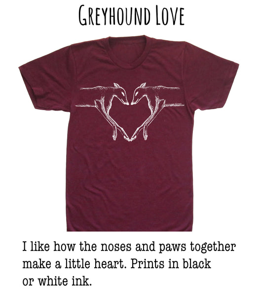 A burgundy t-shirt with a white graphic design depicting two greyhound dogs forming a heart shape.