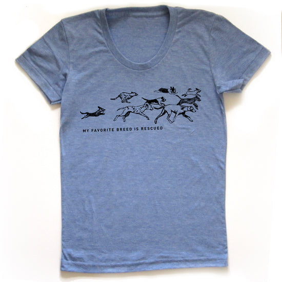 A light blue t-shirt with a graphic design depicting a group of dogs running together.