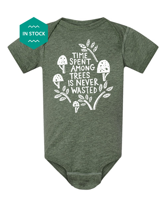 a baby bodysuit that says time spent trees is never wasted
