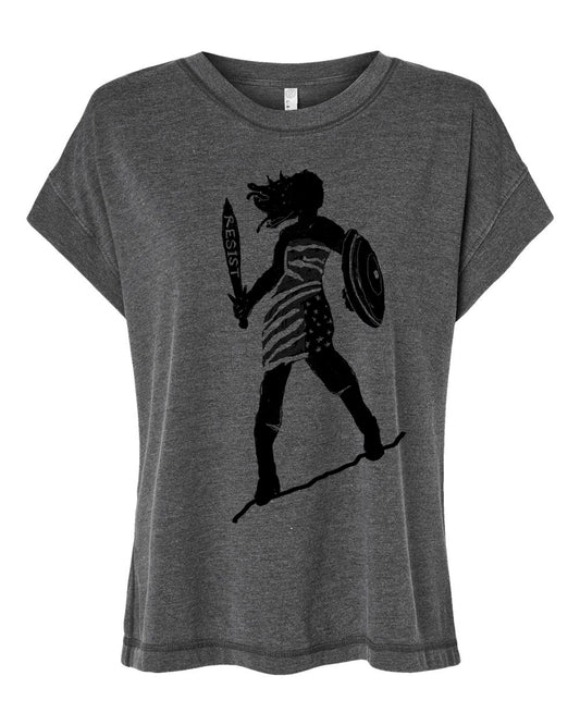 A gray t-shirt with a black graphic design depicting a woman holding a shield and sword, with the word "RESIST" written on the shield.