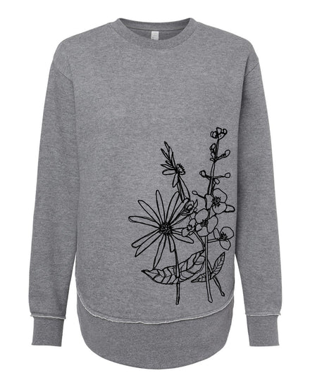 A gray sweatshirt with a black floral design on the left side.