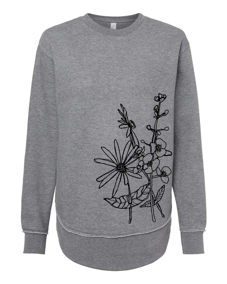 A gray sweatshirt with a black floral design on the left side.