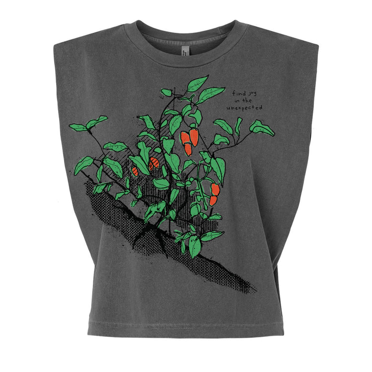 A gray t-shirt with a graphic design depicting a plant with green leaves and orange flowers.