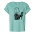 A turquoise t-shirt with a black graphic design depicting a woman's profile with text overlaid.