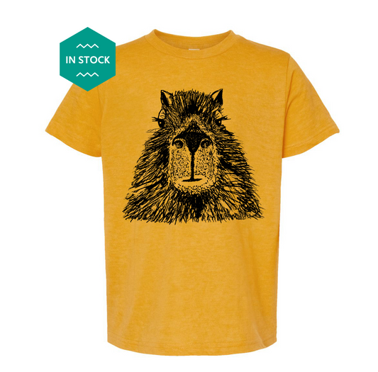 a yellow t - shirt with a picture of a wolf on it
