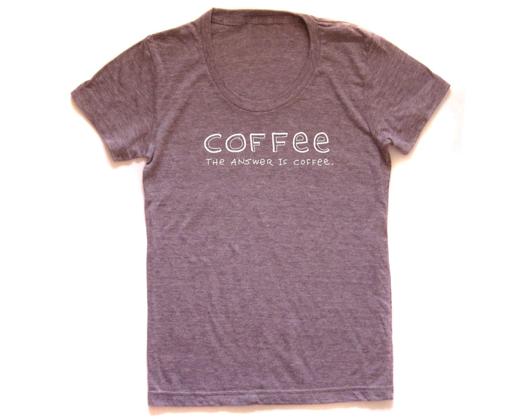 a gray t-shirt with the text "COFFEE THE ANSWER IS COFFEE" printed on it.