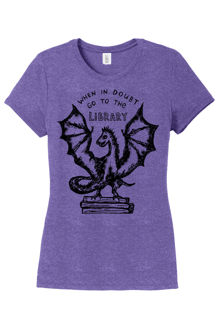a women's purple t - shirt with an image of a dragon on it
