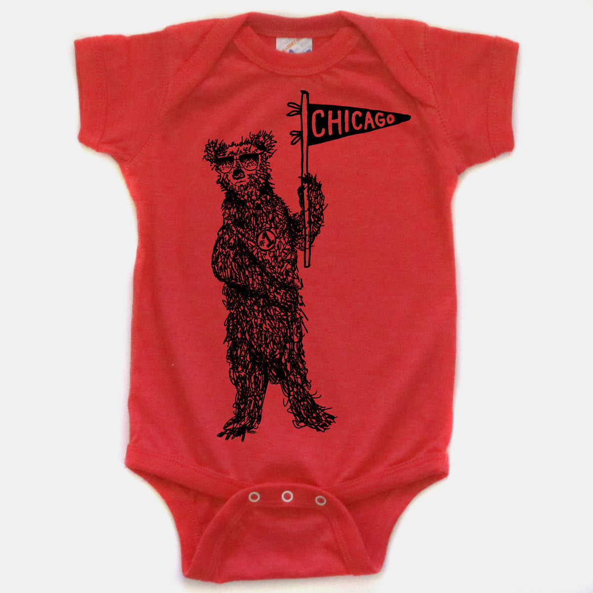 A red baby onesie with a black illustration of a bear holding a Chicago flag.
