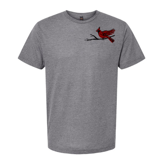 A gray t-shirt with a red cardinal perched on a branch on the left side of the chest area.