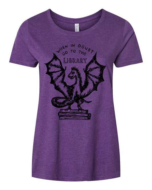 a women's purple t - shirt with an image of a dragon on it