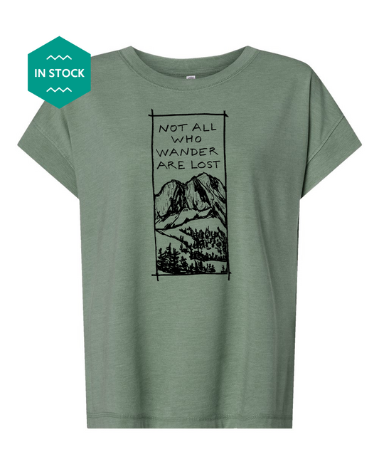 a green t - shirt with a picture of a mountain