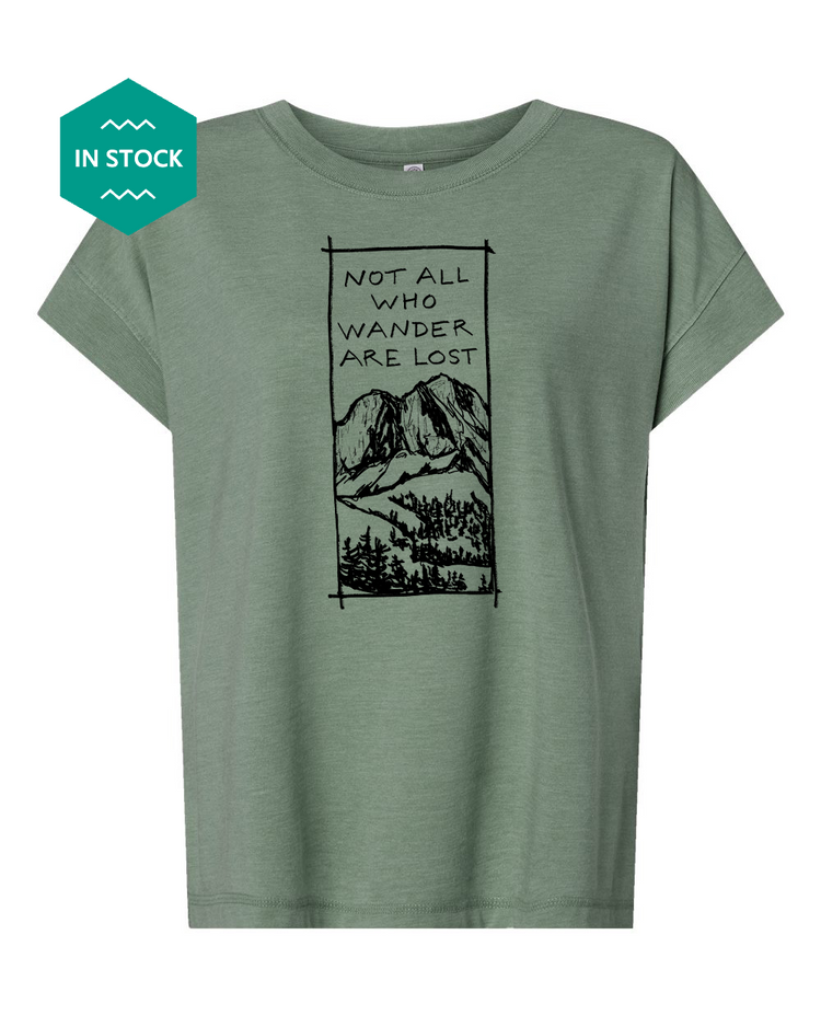 a green t - shirt with a picture of a mountain