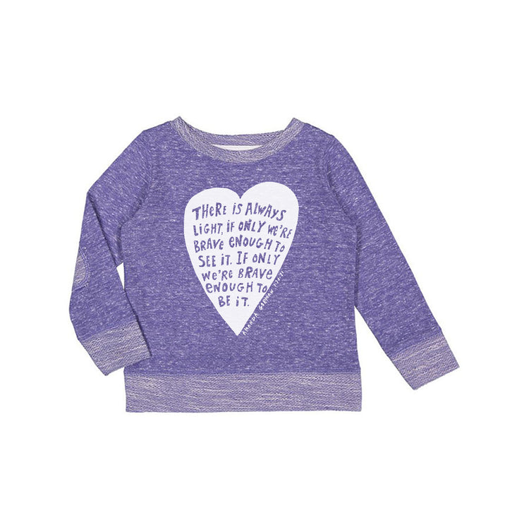 a purple long-sleeved shirt with a heart-shaped design and a quote printed on it.