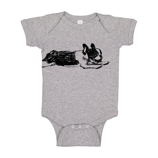 A grey onesie with a black and white drawing of a dog on it.