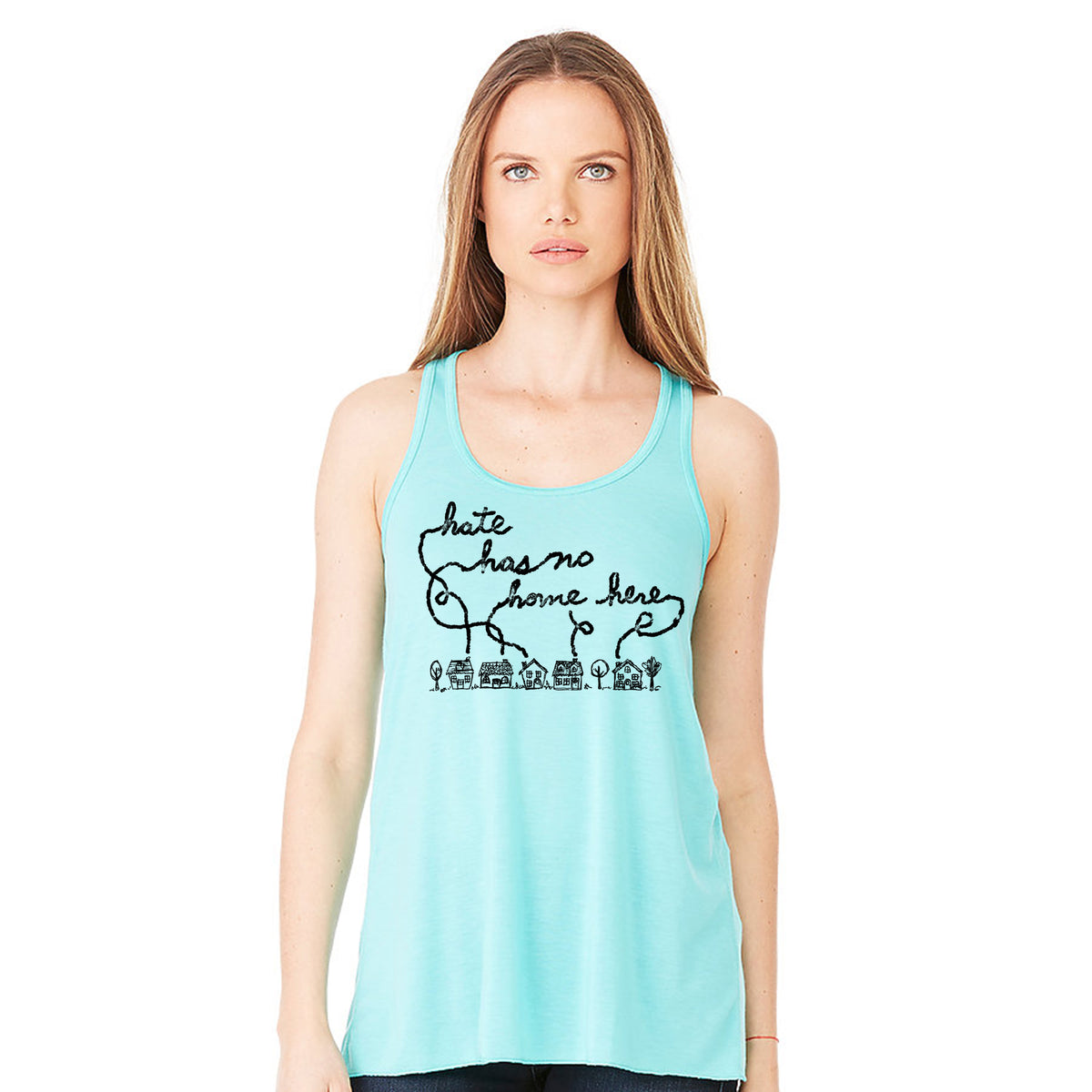 A woman wearing a turquoise tank top with a graphic design on it.