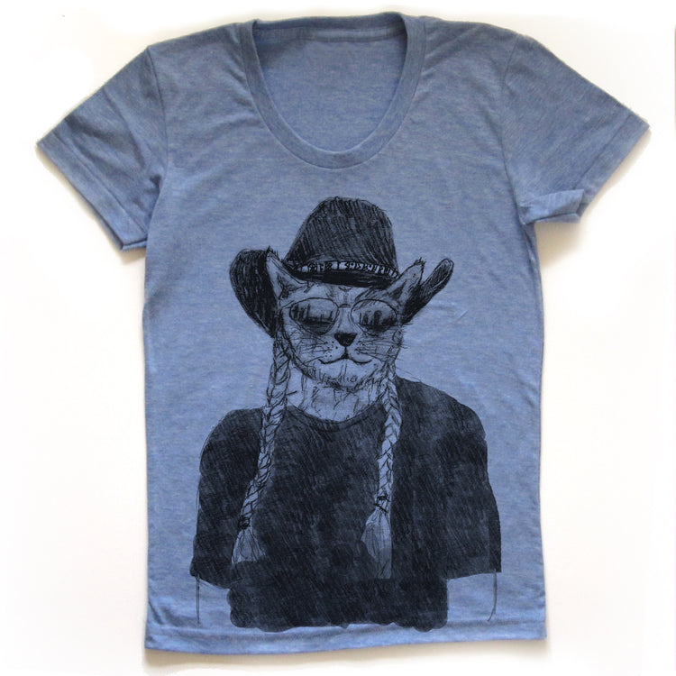 A blue t-shirt with a black and white illustration of a cat wearing a cowboy hat and sunglasses.