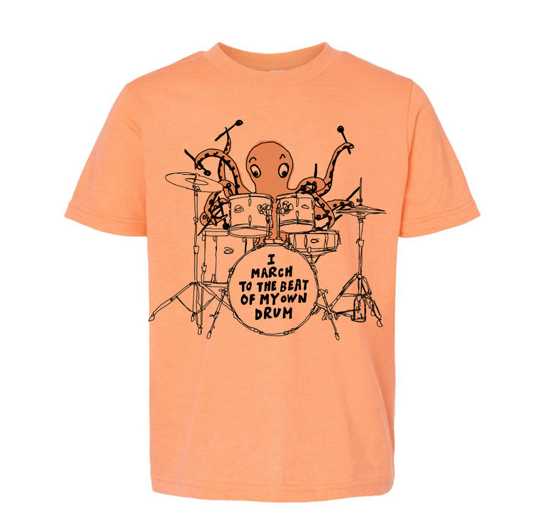 an orange t-shirt with a graphic design depicting an octopus playing a drum set.