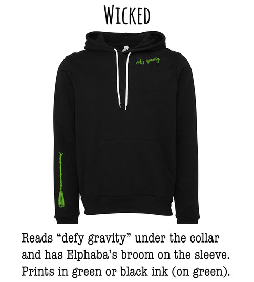 A black hoodie with a green design on the left sleeve, and the text "Wicked" above it.