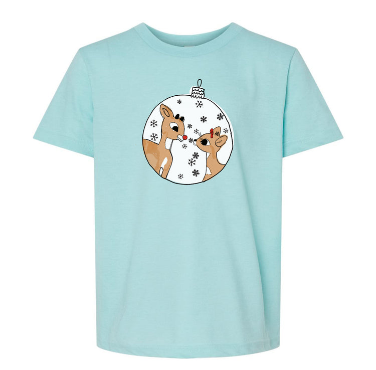 a blue t - shirt with a reindeer and a christmas ball on it