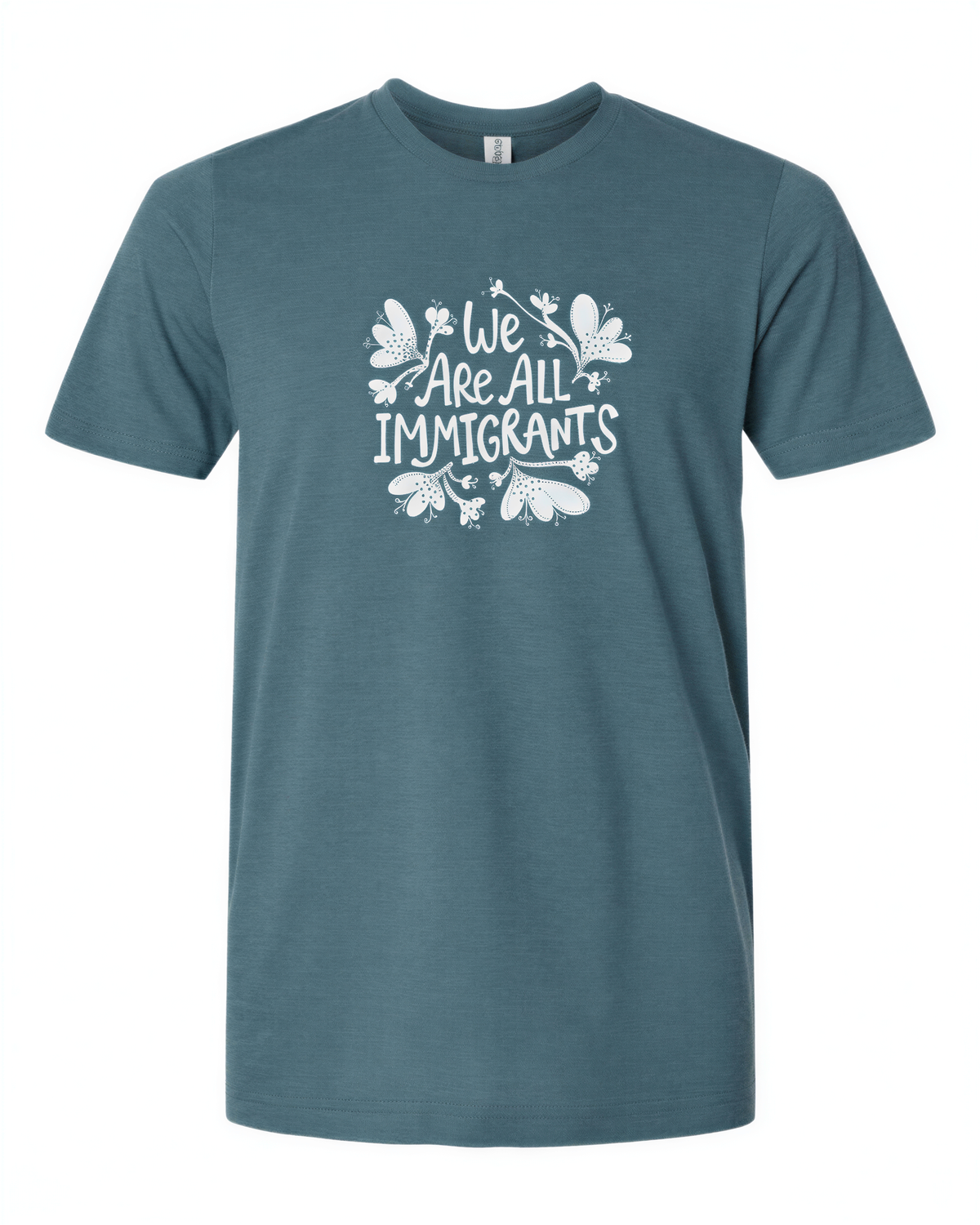 A teal-colored t-shirt with the text "We Are All Immigrants" printed on it in white.