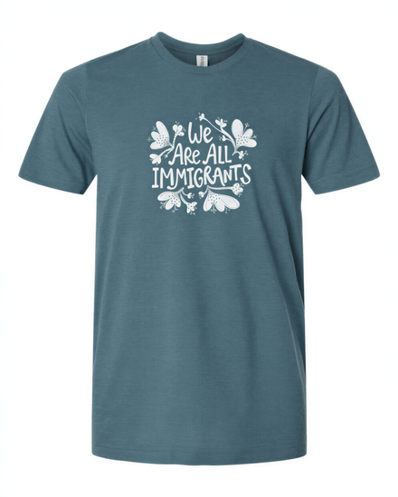 A teal-colored t-shirt with the text "We Are All Immigrants" printed on it in white.