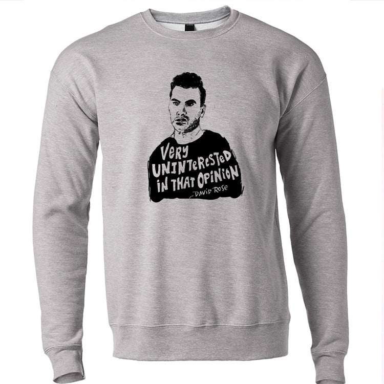 A gray sweatshirt with a black and white graphic of a man's face and the text "Very Uninterested in That Opinion" printed on it.