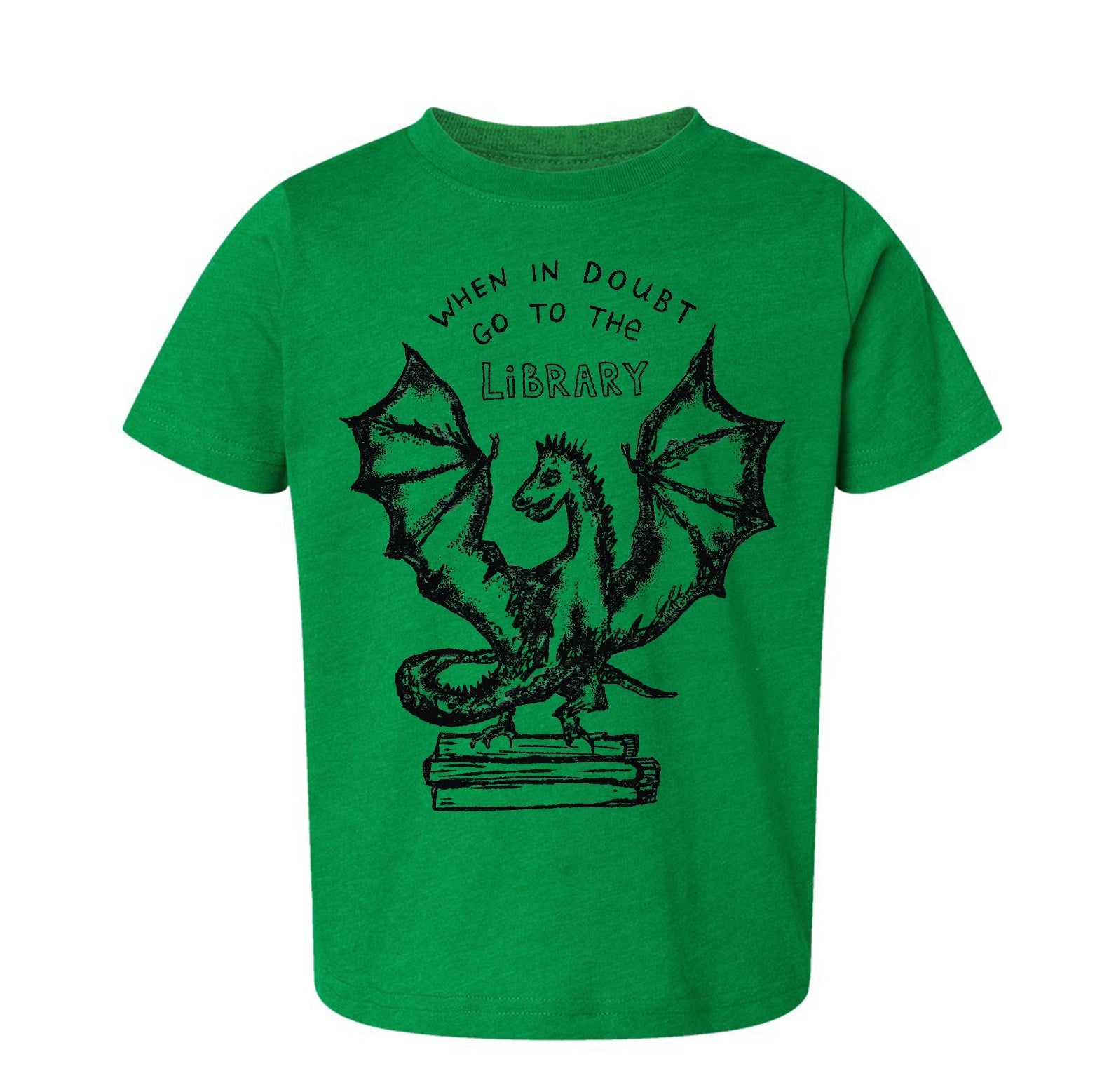 A green t-shirt with a black graphic design depicting a dragon on top of a stack of books, accompanied by the text "WHEN IN DOUBT GO TO THE LIBRARY".