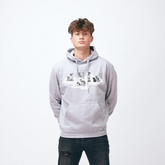 A young man wearing a grey hoodie with a graphic design on it, standing against a white background.