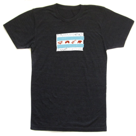 A black t-shirt with a graphic design featuring a flag-like pattern with various symbols and icons printed on it.