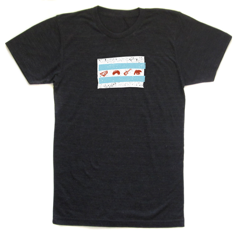 A black t-shirt with a graphic design featuring a flag-like pattern with various symbols and icons printed on it.